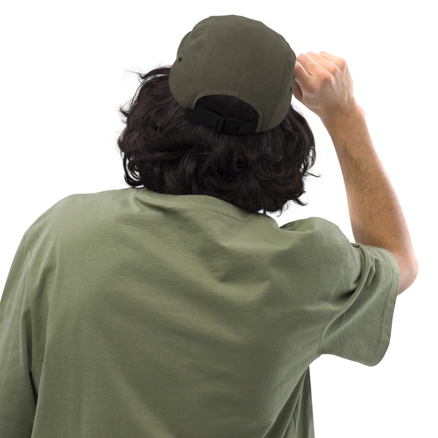 Chillhawk Five Panel Cap olive - back view of a person with medium-toned skin and dark, wavy hair, wearing the olive cap and an olive green t-shirt, adjusting the strap on the back of the cap with their right hand.